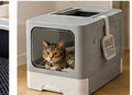 Original supplier image of the enclosed cat litter box with scoop